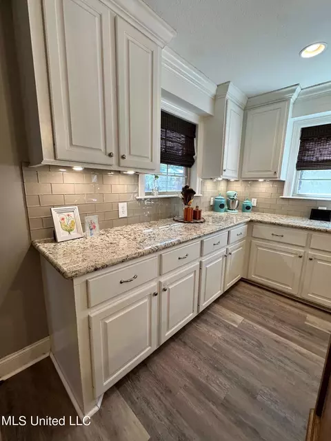 Kitchen - 1408 E Peace St, Canton, MS 39046 photo 3 of 8