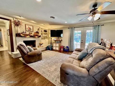 Living - 1408 E Peace St, Canton, MS 39046 photo 5 of 8