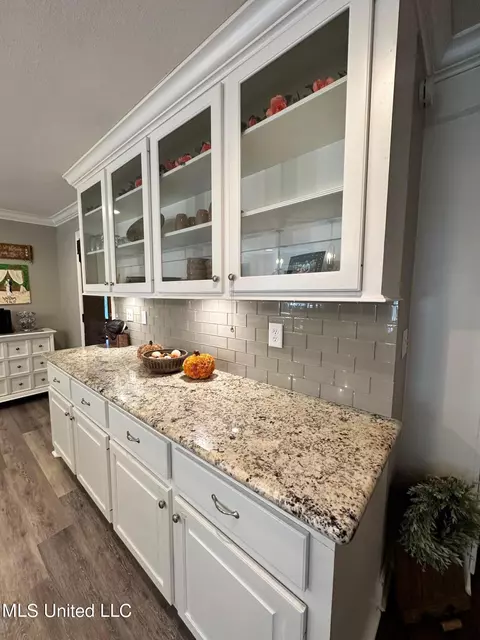 Kitchen - 1408 E Peace St, Canton, MS 39046 photo 8 of 8