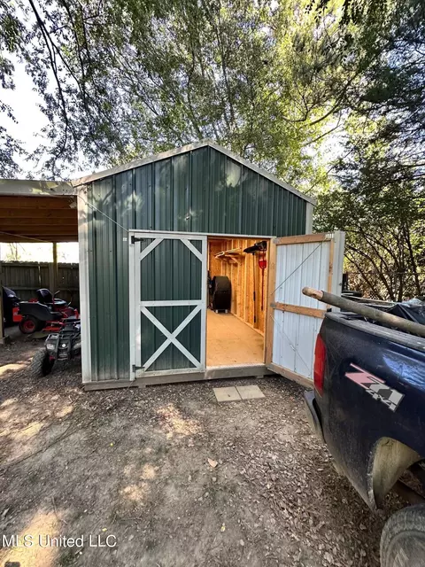 Exterior - 1408 E Peace St, Canton, MS 39046 photo 8 of 18