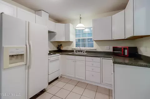 Kitchen - 8176 E Cypress Dr, Perkinston, MS 39573 photo 4 of 4