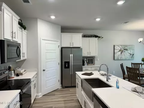 Kitchen - 18400 Spring Hill Dr, Saucier, MS 39574 photo 2 of 2