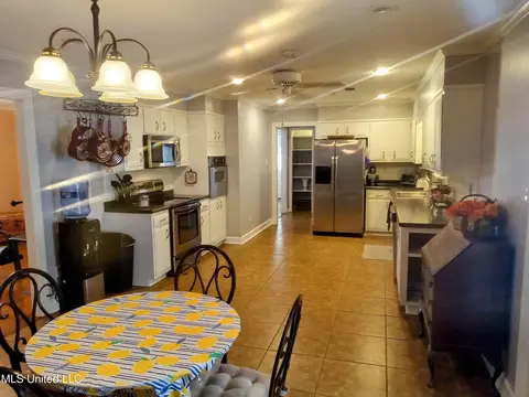 Kitchen - 701 W Gresham St, Indianola, MS 38751 photo 3 of 7