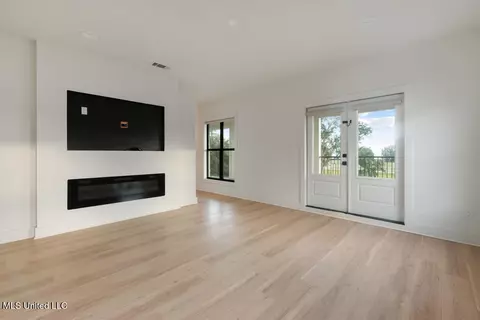 Living - 119 W 4th St, Long Beach, MS 39560 photo 2 of 3