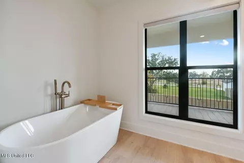 Bath - 119 W 4th St, Long Beach, MS 39560 photo 1 of 5