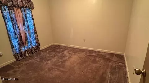 Bedroom - 721 Wicker St, Forest, MS 39074 photo 2 of 2