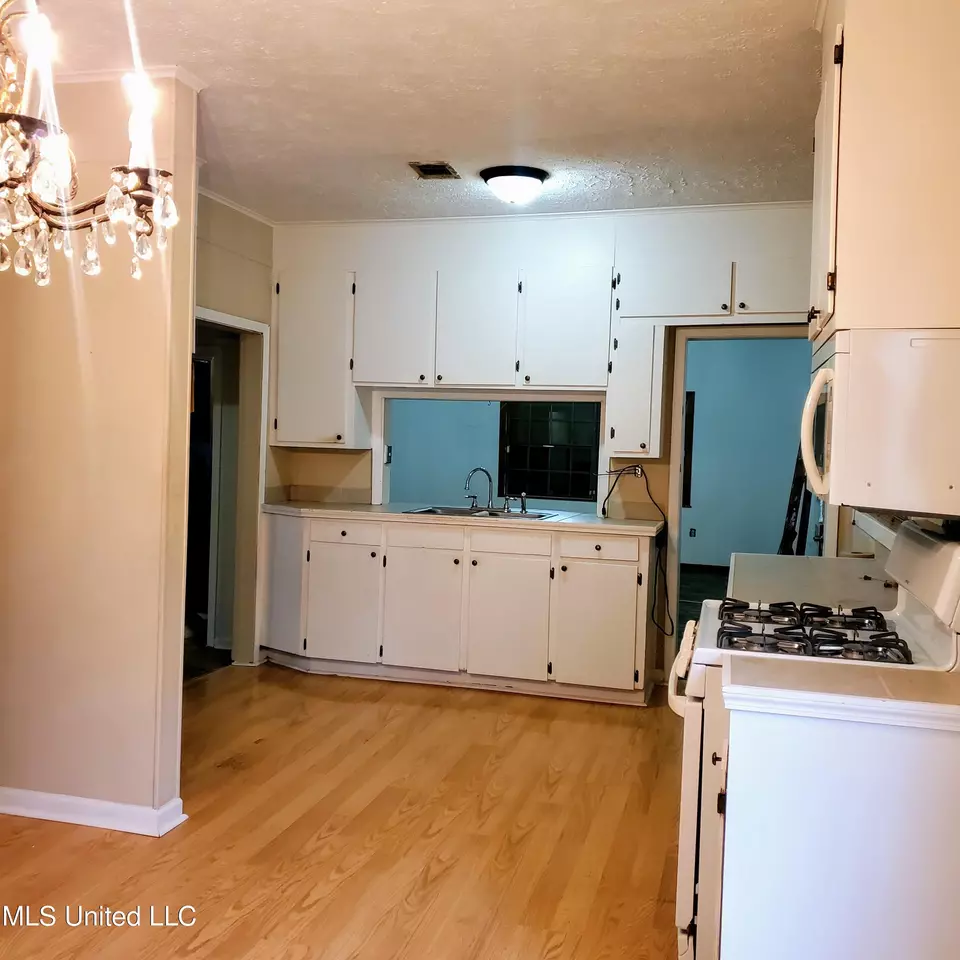 Kitchen - 306 Walnut St, Canton, MS 39046 photo 2 of 2