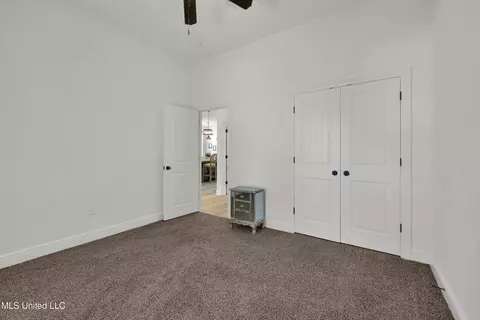 Bedroom - 115 W Third St, Long Beach, MS 39560 photo 5 of 7