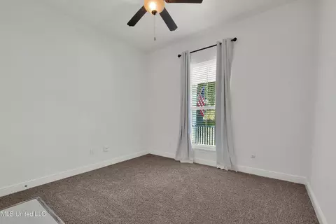 Bedroom - 115 W Third St, Long Beach, MS 39560 photo 4 of 7