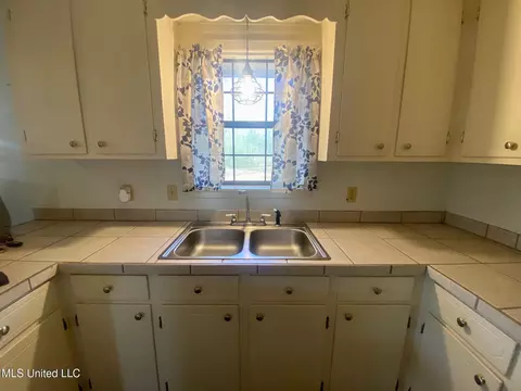 Kitchen - 111 Lewis Ave, Walnut Grove, MS 39189 photo 4 of 5