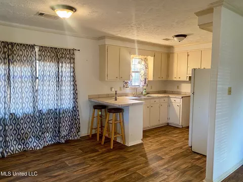 Kitchen - 111 Lewis Ave, Walnut Grove, MS 39189 photo 3 of 5