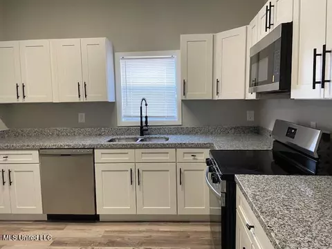 Kitchen - 4040 W Pine St, Moss Point, MS 39563 photo 3 of 3