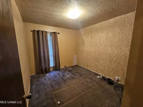Bedroom - 232 N West St, Canton, MS 39046 photo 2 of 3