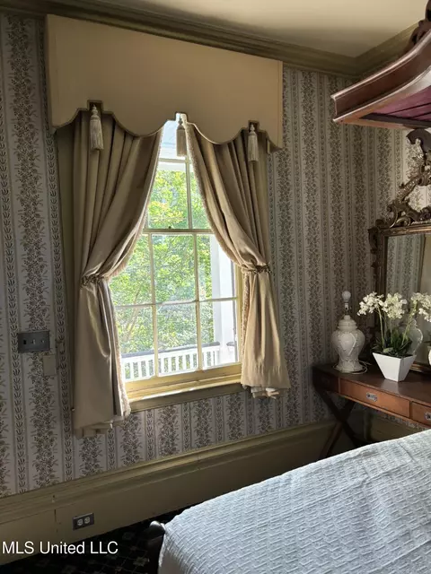 Bedroom - 705 Washington St, Natchez, MS 39120 photo 4 of 5