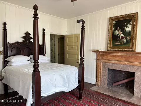 Bedroom - 705 Washington St, Natchez, MS 39120 photo 5 of 5