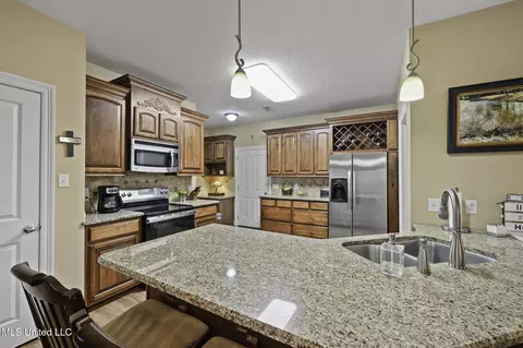 Kitchen - 8195 E Cypress Dr, Perkinston, MS 39573 photo 1 of 2