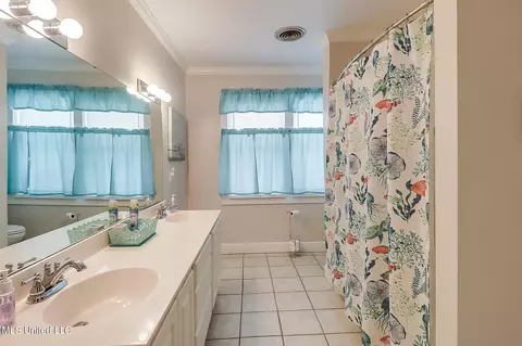 Bath - 121 E Second St, Long Beach, MS 39560 photo 1 of 3