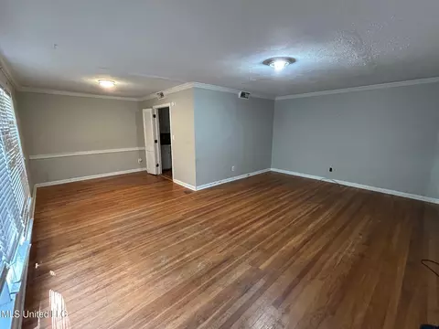 Living - 1680 Winchester St, Jackson, MS 39211 photo 2 of 3