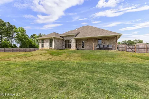 Exterior - 123 Bailey Cv, Canton, MS 39046 photo 7 of 10
