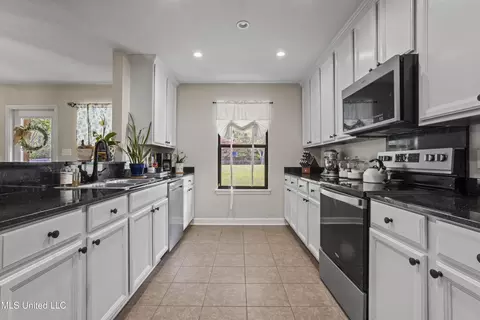 Kitchen - 21380 Edgewood Dr, Saucier, MS 39574 photo 1 of 5