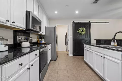 Kitchen - 21380 Edgewood Dr, Saucier, MS 39574 photo 2 of 5