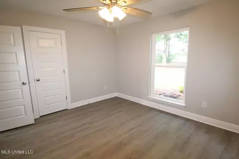 Bedroom - 141 Edger Emerson Cir, Lucedale, MS 39452 photo 9 of 10