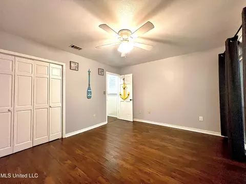 Bedroom - 291 Highpoint Dr #291, Diamondhead, MS 39525 photo 3 of 5