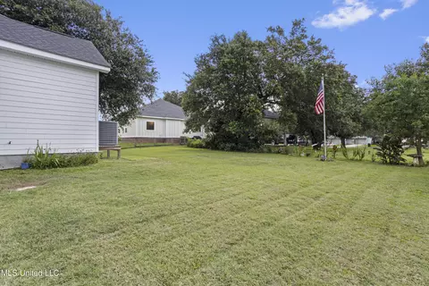 Exterior - 121 E Fourth St, Long Beach, MS 39560 photo 7 of 12