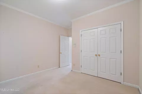 Bedroom - 8136 Saddlebrook Cv, Olive Branch, MS 38654 photo 7 of 9