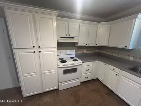 Kitchen - 600 Jackson Ave, Mccomb, MS 39648 photo 2 of 2