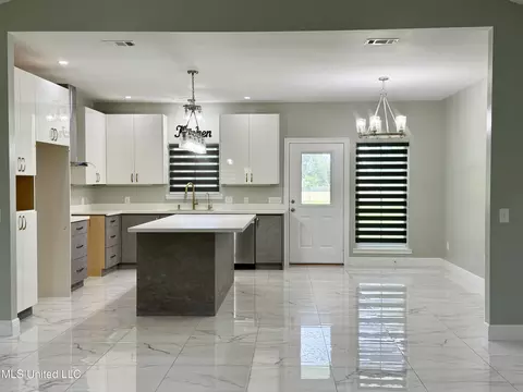 Kitchen - 127 Lloyd Eubanks Rd, Lucedale, MS 39452 photo 1 of 9