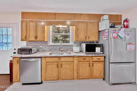 Kitchen - 112 Wolf Branch Rd, Perkinston, MS 39573 photo 3 of 3