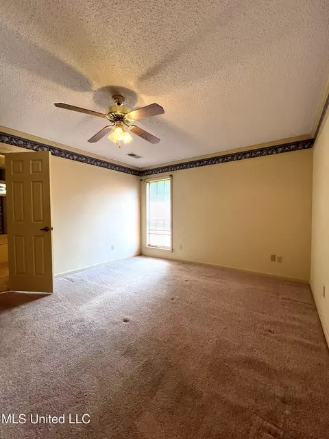 Bedroom - 7582 Dewberry Cv, Olive Branch, MS 38654 photo 1 of 4