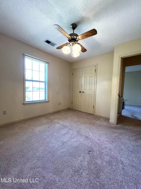 Bedroom - 7582 Dewberry Cv, Olive Branch, MS 38654 photo 2 of 4