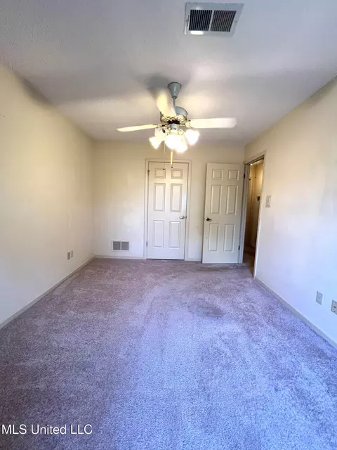 Bedroom - 7582 Dewberry Cv, Olive Branch, MS 38654 photo 4 of 4