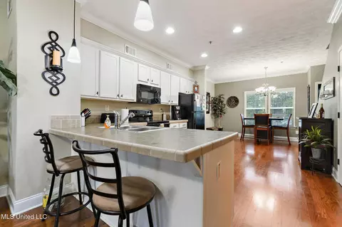 Kitchen - 208 E Orchard Loop #208, D'iberville, MS 39540 photo 1 of 2