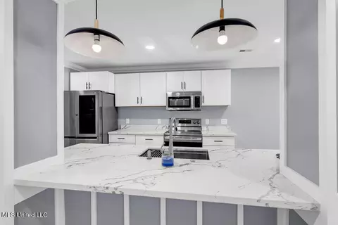 Kitchen - 280 Highpoint Dr, Diamondhead, MS 39525 photo 2 of 5