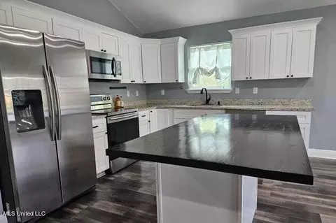 Kitchen - 19570 Rudd Dr, Saucier, MS 39574 photo 1 of 2