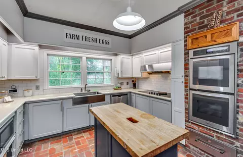 Kitchen - 153 Peach St, Flora, MS 39071 photo 1 of 10