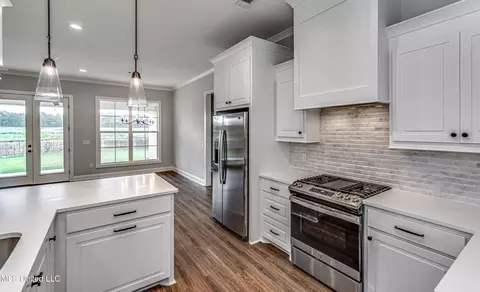 Kitchen - 502 Black Cherry Cv, Canton, MS 39046 photo 6 of 14