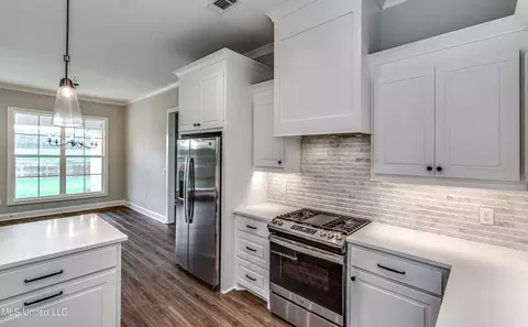 Kitchen - 502 Black Cherry Cv, Canton, MS 39046 photo 14 of 14