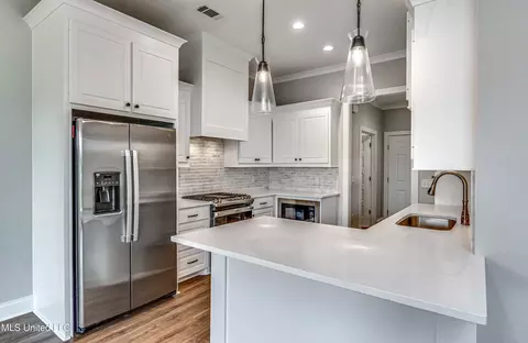 Kitchen - 502 Black Cherry Cv, Canton, MS 39046 photo 2 of 14