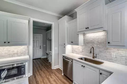 Kitchen - 502 Black Cherry Cv, Canton, MS 39046 photo 11 of 14