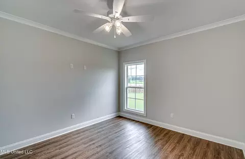 Bedroom - 502 Black Cherry Cv, Canton, MS 39046 photo 9 of 11