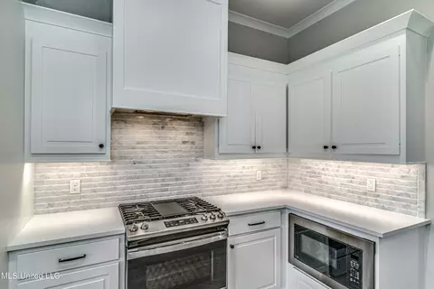 Kitchen - 502 Black Cherry Cv, Canton, MS 39046 photo 12 of 14