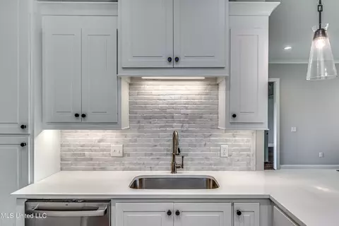 Kitchen - 502 Black Cherry Cv, Canton, MS 39046 photo 9 of 14