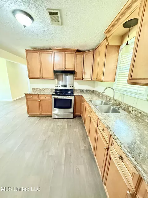 Kitchen - 219 Mississippi Ave, Grenada, MS 38901 photo 1 of 2