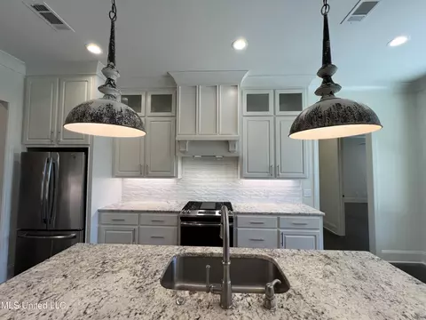 Kitchen - 731 Glenwild Dr, Canton, MS 39046 photo 11 of 12