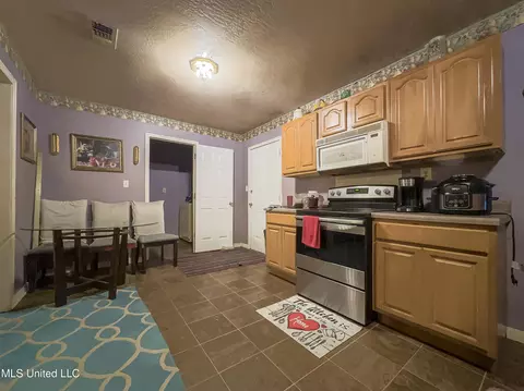 Kitchen - 209 11th St, Mount Olive, MS 39119 photo 2 of 2