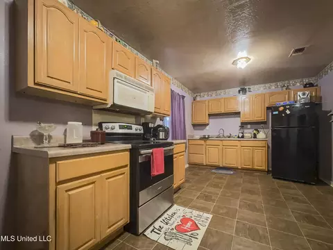 Kitchen - 209 11th St, Mount Olive, MS 39119 photo 1 of 2